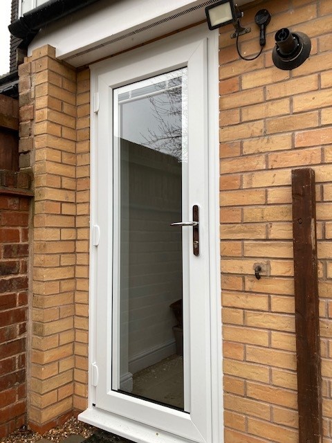UPVC DOOR WITH BLIND IN GLASS