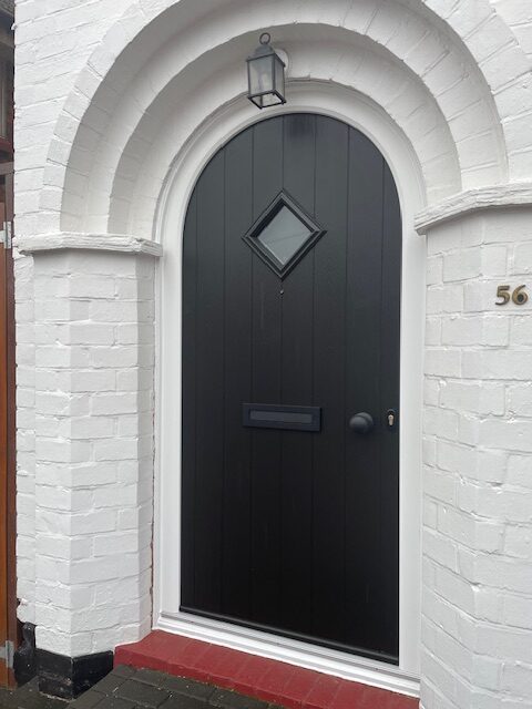 BESPOKE FLINT ARCHED DOOR